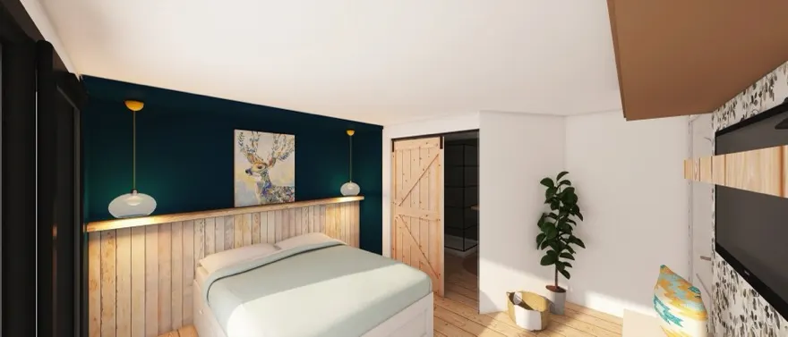 Suite parentale aménagée dans une maison de ville : mur bleu canard, tête de lit en lambris et porte coulissante